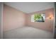 Cozy bedroom with natural light, neutral carpet and wall color at 7682 St Andrews Blvd, Weeki Wachee, FL 34613