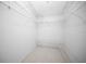 Walk-in closet with shelving and carpeted floors at 7682 St Andrews Blvd, Weeki Wachee, FL 34613