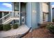 Inviting condo featuring a blue exterior with a well-maintained landscape at 7682 St Andrews Blvd, Weeki Wachee, FL 34613