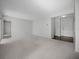 Spacious living room with neutral carpet, providing a blank canvas at 7682 St Andrews Blvd, Weeki Wachee, FL 34613