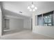 Bright living room with a large window at 7682 St Andrews Blvd, Weeki Wachee, FL 34613