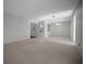 Large living room featuring neutral walls and carpet at 7682 St Andrews Blvd, Weeki Wachee, FL 34613