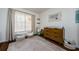 Lovely bedroom with hardwood floors, natural light, and custom decorations at 7807 Hardwick Dr # 123, New Port Richey, FL 34653
