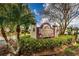 Millpond Trace community sign surrounded by lush landscaping, showcasing the neighborhood's entrance at 7807 Hardwick Dr # 123, New Port Richey, FL 34653