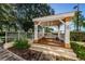 Charming gazebo with seating, ideal for relaxing and enjoying the peaceful outdoor setting at 7807 Hardwick Dr # 123, New Port Richey, FL 34653