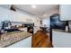 Charming kitchen featuring white cabinets and granite countertops at 7807 Hardwick Dr # 123, New Port Richey, FL 34653