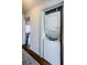 Modern stacked washer and dryer laundry unit at 7807 Hardwick Dr # 123, New Port Richey, FL 34653