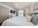 Spacious main bedroom with hardwood floors, ceiling fan, lots of natural light, and a modern design at 7807 Hardwick Dr # 123, New Port Richey, FL 34653