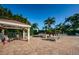 Inviting poolside gazebo with comfortable seating, ideal for relaxing and socializing while enjoying the beautiful surroundings at 7807 Hardwick Dr # 123, New Port Richey, FL 34653