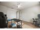 Bedroom featuring desk, chair, carpet, and a window for natural light at 8388 Maltby Rd, Spring Hill, FL 34606