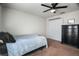 Bedroom features closet and dresser against light-colored walls at 8388 Maltby Rd, Spring Hill, FL 34606