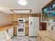 Bright kitchen with modern appliances, wood cabinetry, and ample counter space at 8393 Delaware Dr, Weeki Wachee, FL 34607