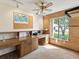 Well-lit office boasts a built-in desk, lots of storage, and a large window at 8393 Delaware Dr, Weeki Wachee, FL 34607