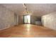 Spacious attic featuring unique ceiling texture, natural light, and potential for customization at 8568 Heather Blvd, Weeki Wachee, FL 34613