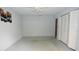 Bright bedroom with ceiling fan, closet, and decorative artwork at 8568 Heather Blvd, Weeki Wachee, FL 34613
