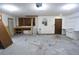 Spacious garage with shelving and workspace, offering ample storage and project area at 8568 Heather Blvd, Weeki Wachee, FL 34613