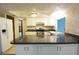 Fully equipped kitchen with an island and modern appliances at 8568 Heather Blvd, Weeki Wachee, FL 34613