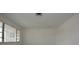 Bright living room with large window that provides natural light at 8568 Heather Blvd, Weeki Wachee, FL 34613