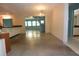 Open concept living space with views into the kitchen and dining area, perfect for entertaining at 8568 Heather Blvd, Weeki Wachee, FL 34613