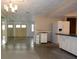 Bright and open concept living area with tile floors at 8568 Heather Blvd, Weeki Wachee, FL 34613