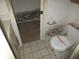 Dated bathroom with tile floors, showing significant mold and wear, requiring extensive renovation at 8640 Lake Isle Dr # 188, Temple Terrace, FL 33637