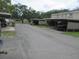 Community parking showing covered carport for each unit at 8640 Lake Isle Dr # 188, Temple Terrace, FL 33637