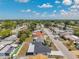 Enjoy the beautiful sky over this lovely neighborhood with diverse homes and mature trees at 9005 Lido Ln, Port Richey, FL 34668