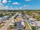 This aerial shot reveals a well-established neighborhood with a mix of home styles and mature landscaping at 9005 Lido Ln, Port Richey, FL 34668