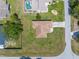 An overhead view highlights the property's manicured lawn and its convenient location within a quiet community at 9251 Geneva St, Spring Hill, FL 34608