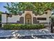 Gated community entrance showcasing the name 'Florencia' with ornate architectural details at 9933 Milano Dr, Trinity, FL 34655