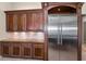 Kitchen with a Viking refrigerator, granite countertops, and custom cabinets at 9933 Milano Dr, Trinity, FL 34655
