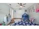 bedroom features playful decor and ample storage at 1004 Peninsula Ave, Tarpon Springs, FL 34689