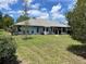 Spacious backyard with an exterior view of home at 10054 Hernando Ridge Rd, Weeki Wachee, FL 34613