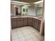 Bright bathroom features double sinks with granite countertops and decorative hardware at 10054 Hernando Ridge Rd, Weeki Wachee, FL 34613