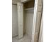 A roomy closet offers ample storage space with built-in shelving and easy access at 10054 Hernando Ridge Rd, Weeki Wachee, FL 34613