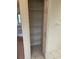 Linen closet has lots of wire shelves for plenty of storage space at 10054 Hernando Ridge Rd, Weeki Wachee, FL 34613