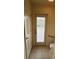 Exterior access via bathroom has bars and blinds at 10054 Hernando Ridge Rd, Weeki Wachee, FL 34613