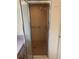 Neutral bathroom with step in shower, grab bar and tiled shower walls at 10054 Hernando Ridge Rd, Weeki Wachee, FL 34613