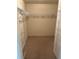Large walk-in closet with ample storage and shelving, perfect for organizing clothes and accessories at 10054 Hernando Ridge Rd, Weeki Wachee, FL 34613