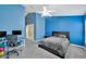 View of bedroom, featuring a vaulted ceiling with ceiling fan, carpet flooring and ensuite bathroom at 1009 Summer Breeze Dr, Brandon, FL 33511