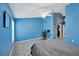 View of bedroom, featuring vaulted ceiling with ceiling fan, carpet flooring and adjacent closet at 1009 Summer Breeze Dr, Brandon, FL 33511