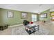 Comfortable living room with stylish contemporary furnishings and decor and bright natural light at 1009 Summer Breeze Dr, Brandon, FL 33511