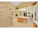 Bright bathroom featuring walk-in shower, soaking tub, vanity, and walk-in closet at 1009 Summer Breeze Dr, Brandon, FL 33511