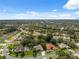 Overhead shot of a residential area with lush greenery and well-spaced homes at 10296 Palmgren, Spring Hill, FL 34608