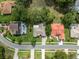 Bird's-eye view of neighborhood showcasing mature trees and well-manicured lawns at 10296 Palmgren, Spring Hill, FL 34608