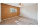 Neutral bedroom with carpeting and a decorative wall at 10296 Palmgren, Spring Hill, FL 34608