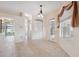 Light dining area with tile floors and sliding glass doors to outdoor patio at 10296 Palmgren, Spring Hill, FL 34608