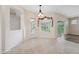 Light dining area with tile floors and sliding glass doors to outdoor patio at 10296 Palmgren, Spring Hill, FL 34608