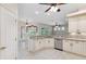 Bright kitchen features granite counters and stainless appliances at 10296 Palmgren, Spring Hill, FL 34608