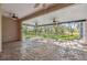 Expansive screened porch with decorative flooring, ceiling fans, and scenic views at 10296 Palmgren, Spring Hill, FL 34608